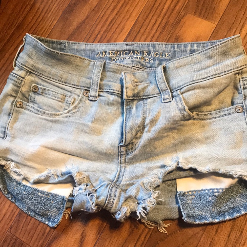 shorts with embroidered hanging pockets